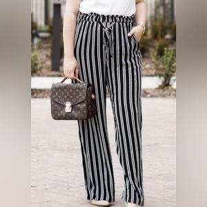 Xhilaration black and white strip slacks